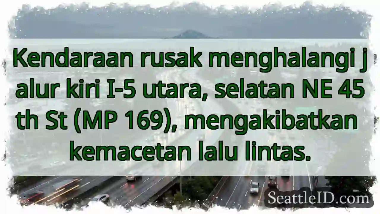 Macet I-5: Kendaraan rusak, jalur kiri terhalang.